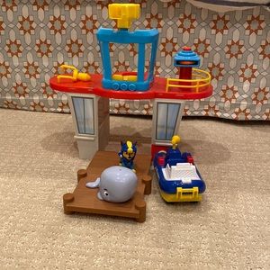 Paw Patrol dock with Chase and his boat and a whale